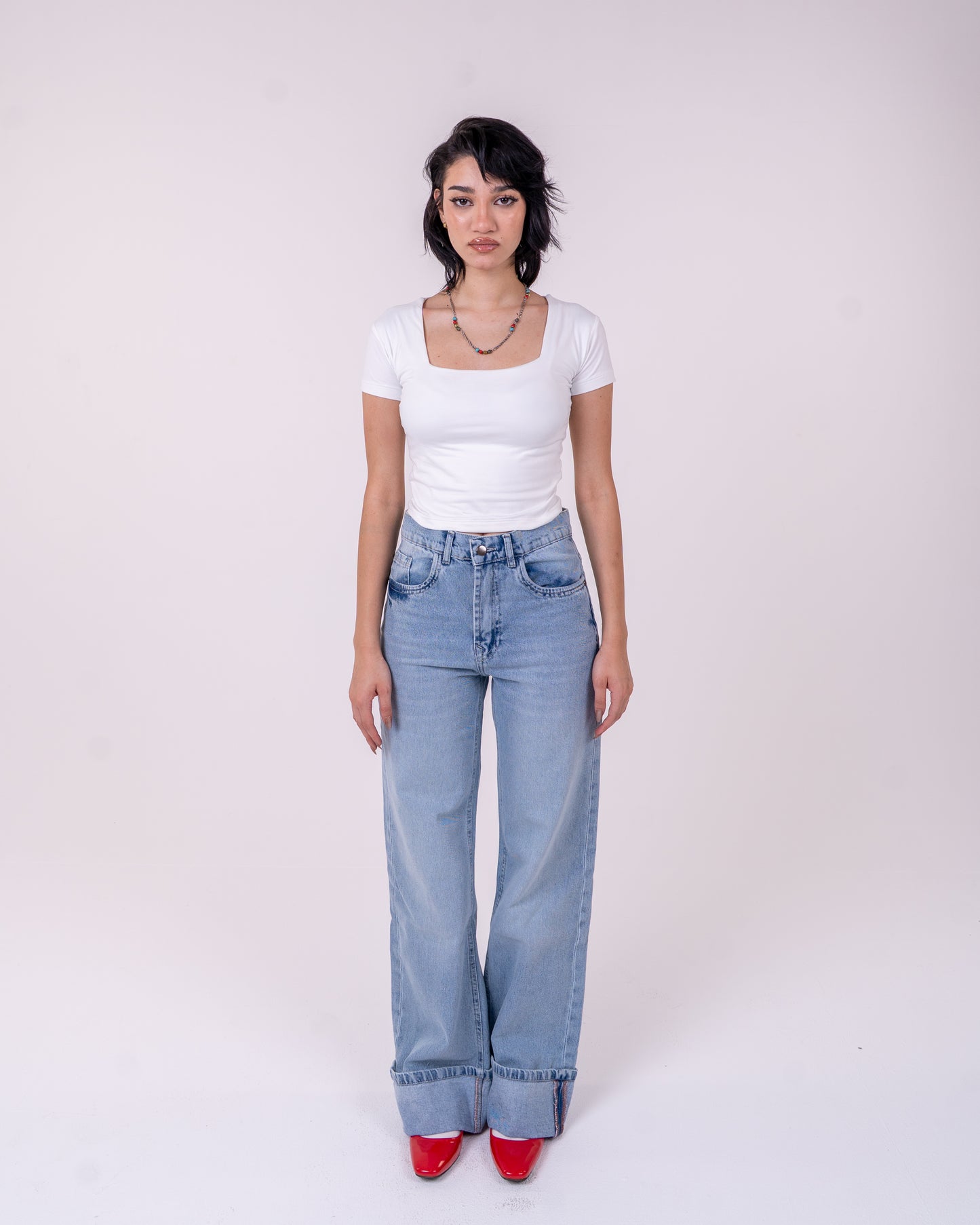 Folded Light Blue Denim Pants