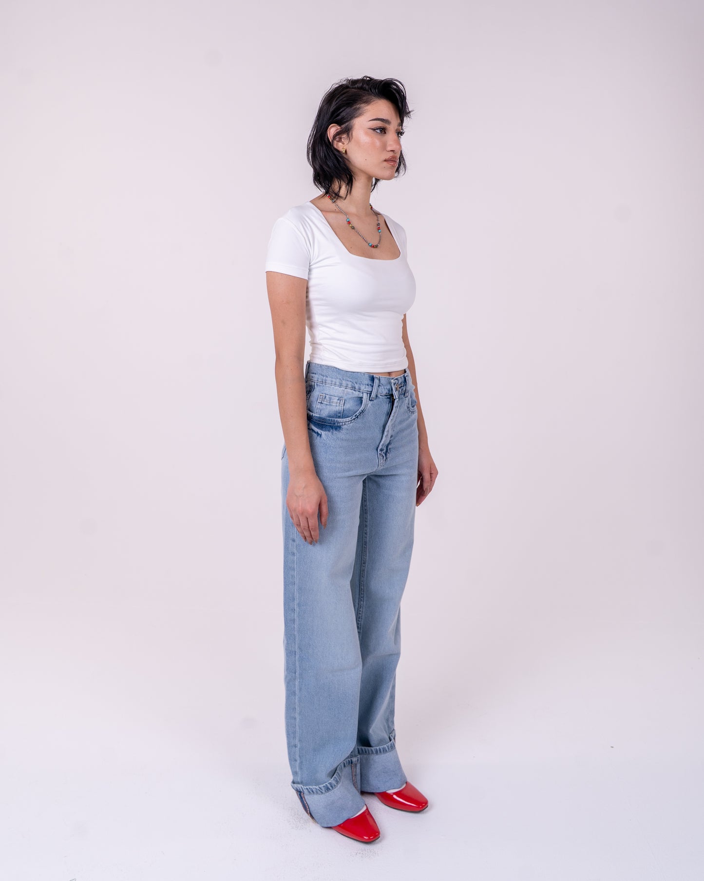 Folded Light Blue Denim Pants