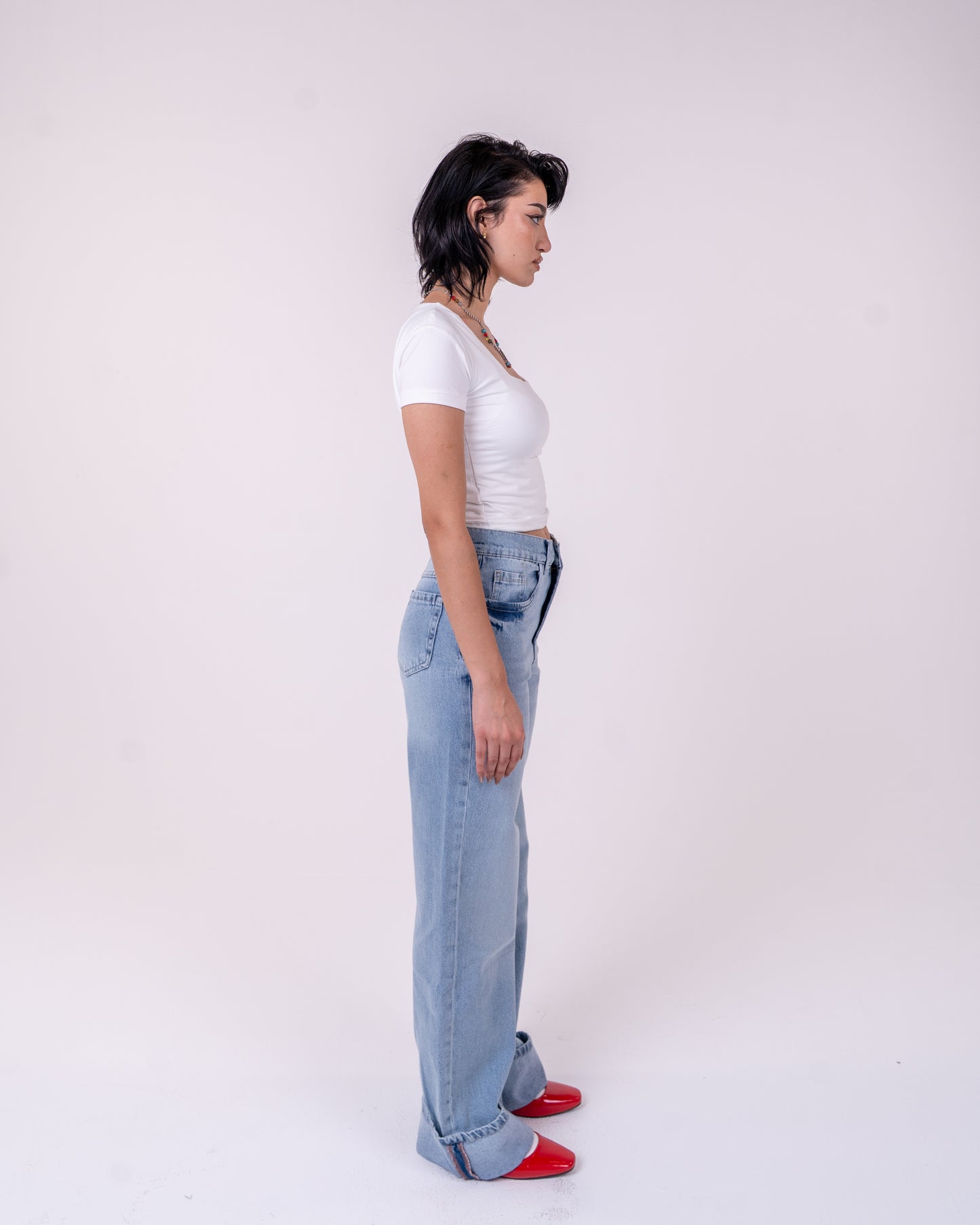 Folded Light Blue Denim Pants
