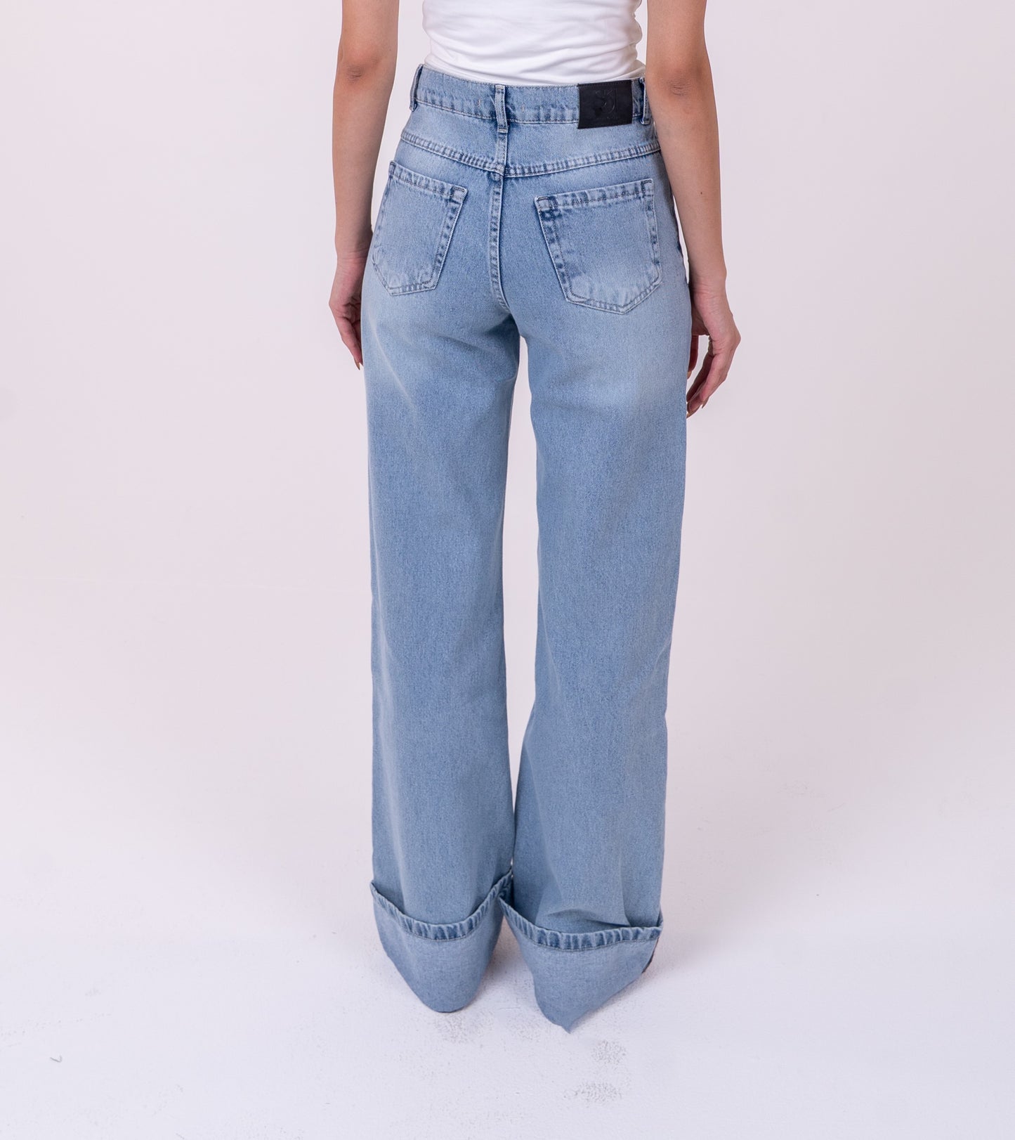 Folded Light Blue Denim Pants