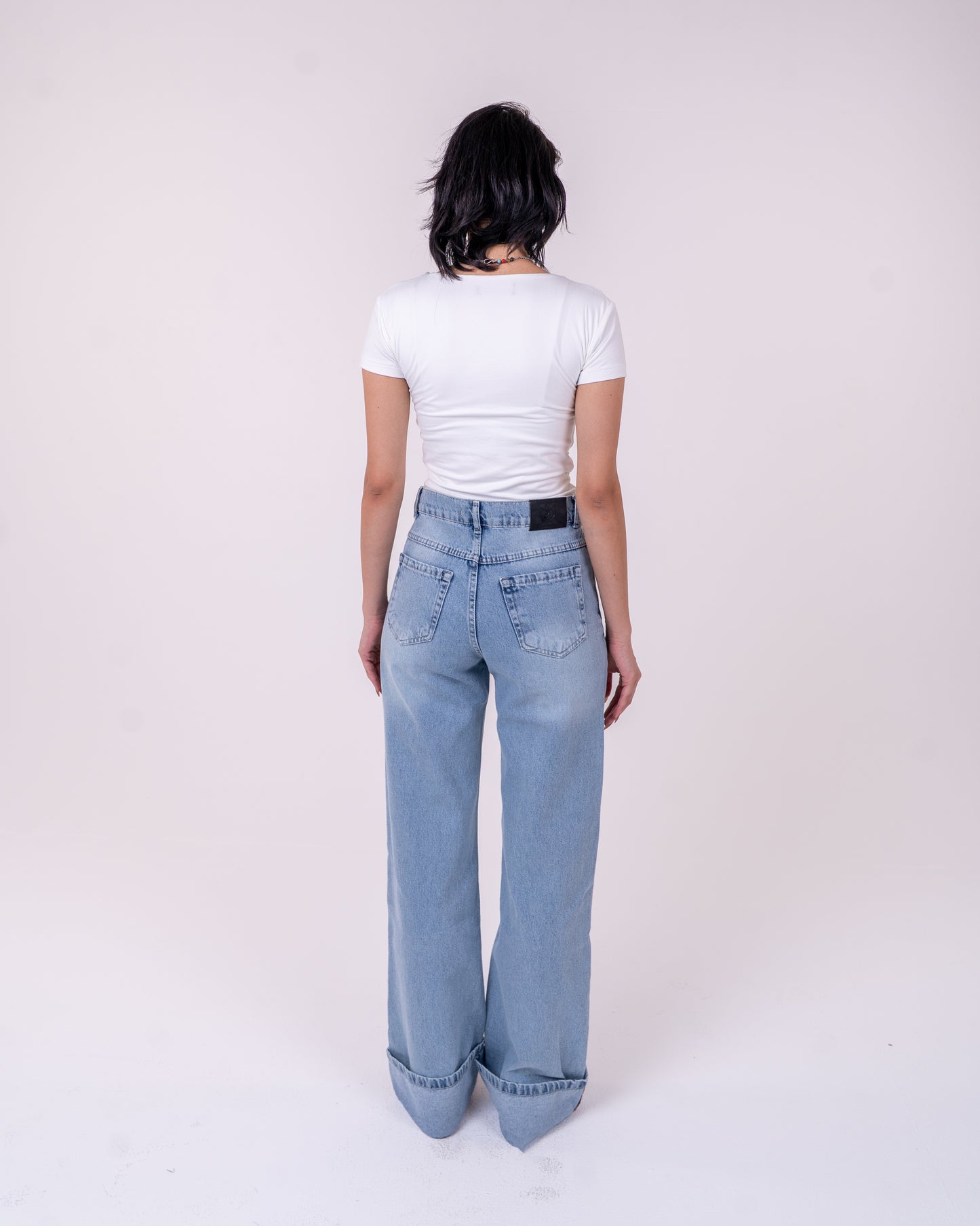 Folded Light Blue Denim Pants