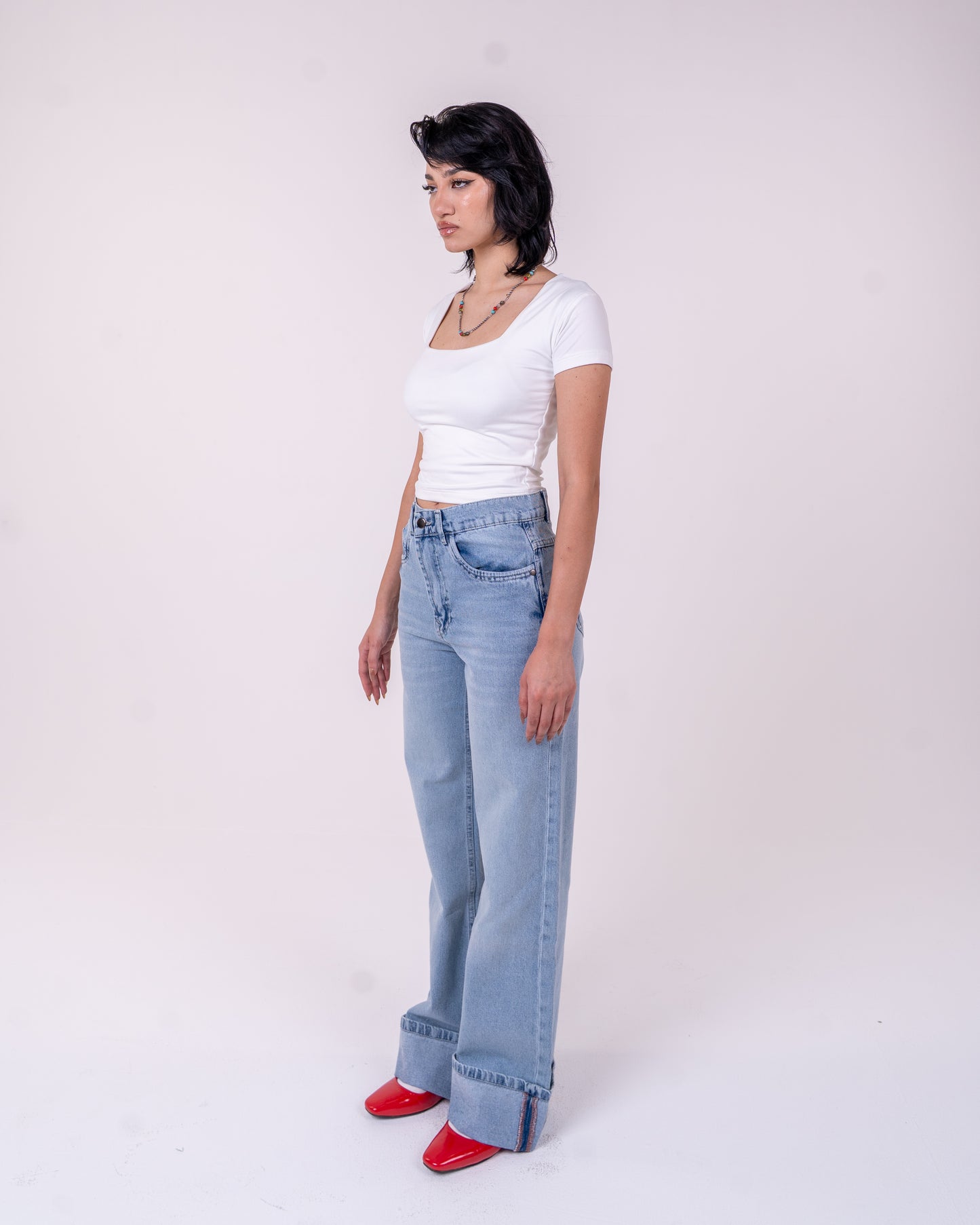 Folded Light Blue Denim Pants